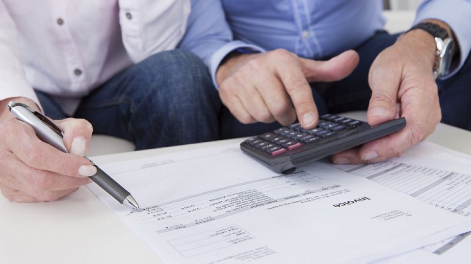 Close-up of couple doing finances at home